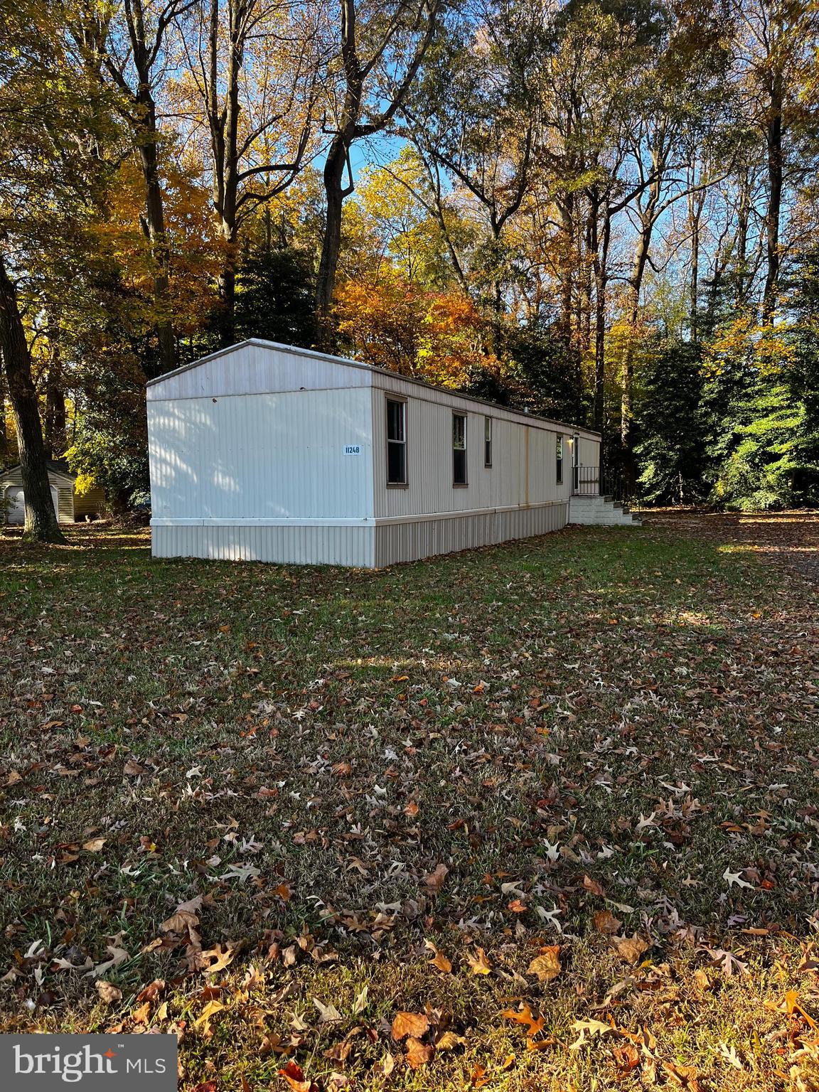 11248 Curt Dogg Road Lincoln, DE 19960 - Photo 1 of 18 a front view of house with garden