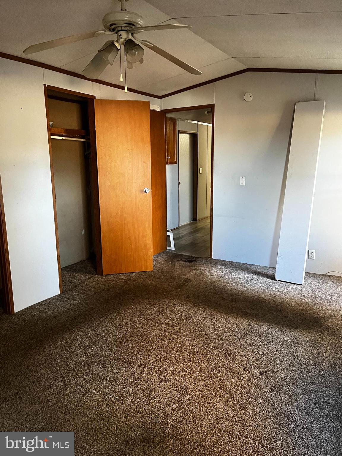 11248 Curt Dogg Road Lincoln, DE 19960 - Photo 17 of 18 a view of an empty room with a chandelier fan