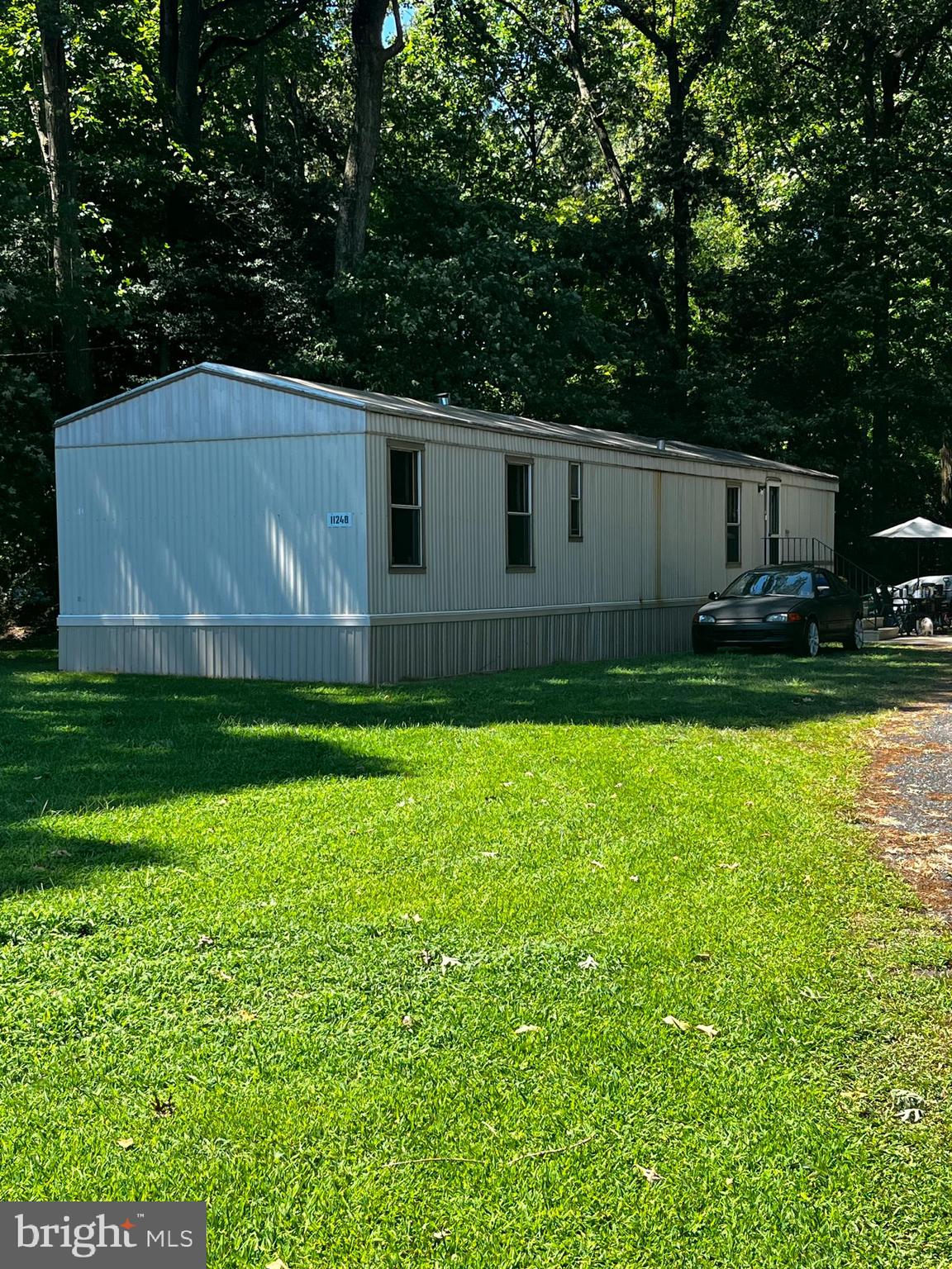 11248 Curt Dogg Road Lincoln, DE 19960 - Photo 2 of 18 a view of a backyard of the house