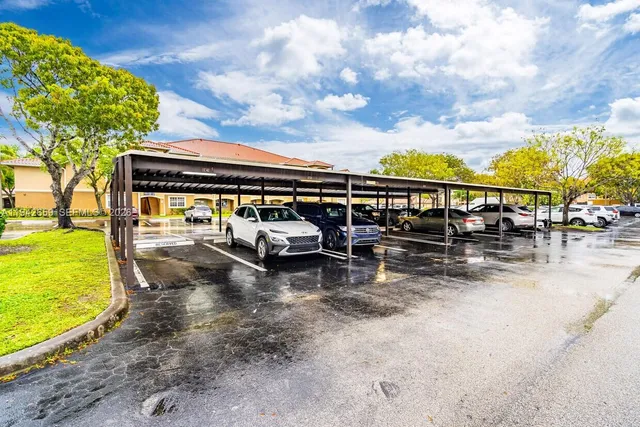 a view of a swimming pool with a patio