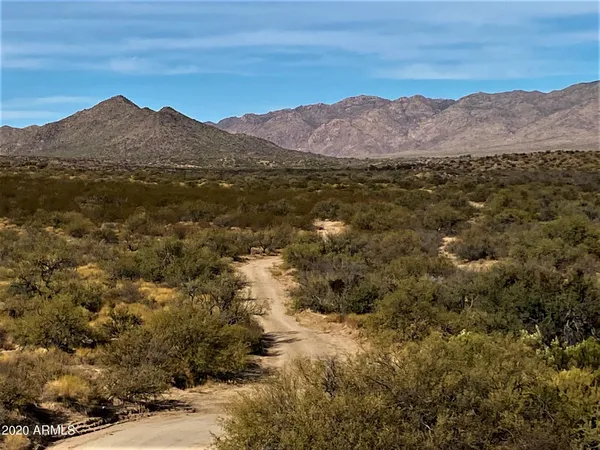 a view of mountains and valleys