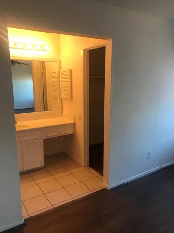 a bathroom with a shower and a toilet