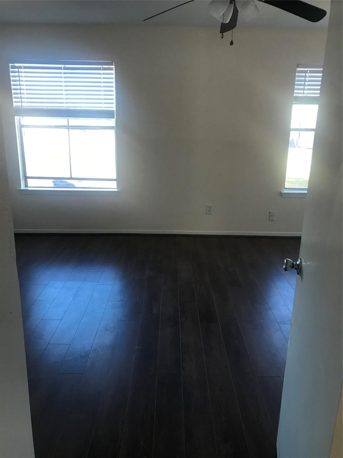 8646 Maplecrest Drive Houston, TX 77099 - Photo 13 of 13 an empty room with a window