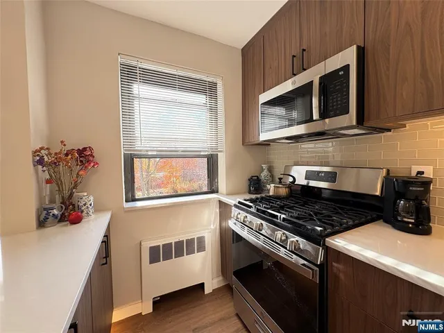 a bathroom with a sink and a window