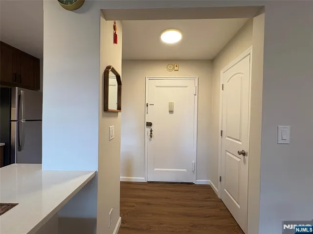 a bedroom with furniture and window