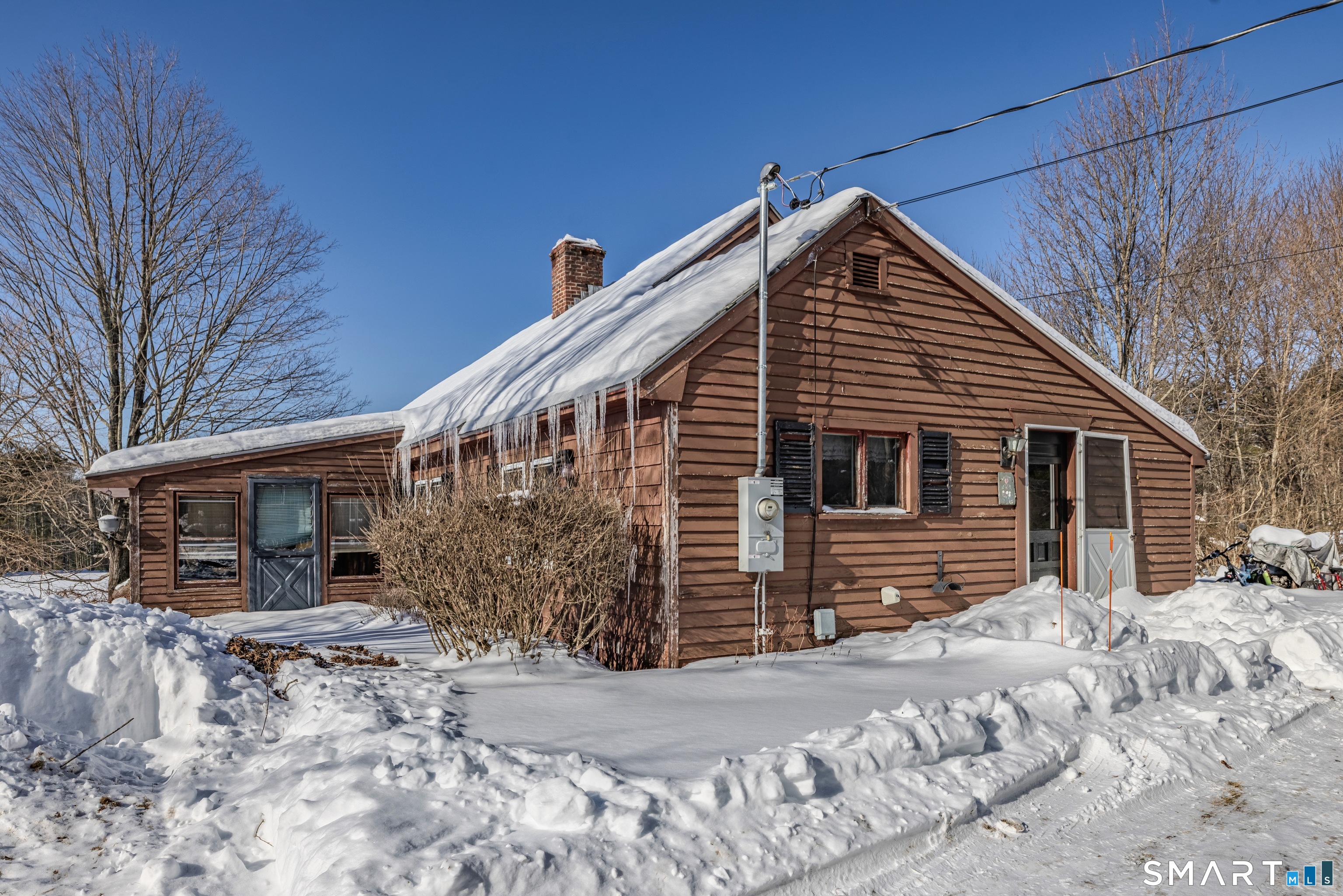 78 East Putnam Road Putnam, CT 06260 - Photo 11 of 26 a front view of house with a yard