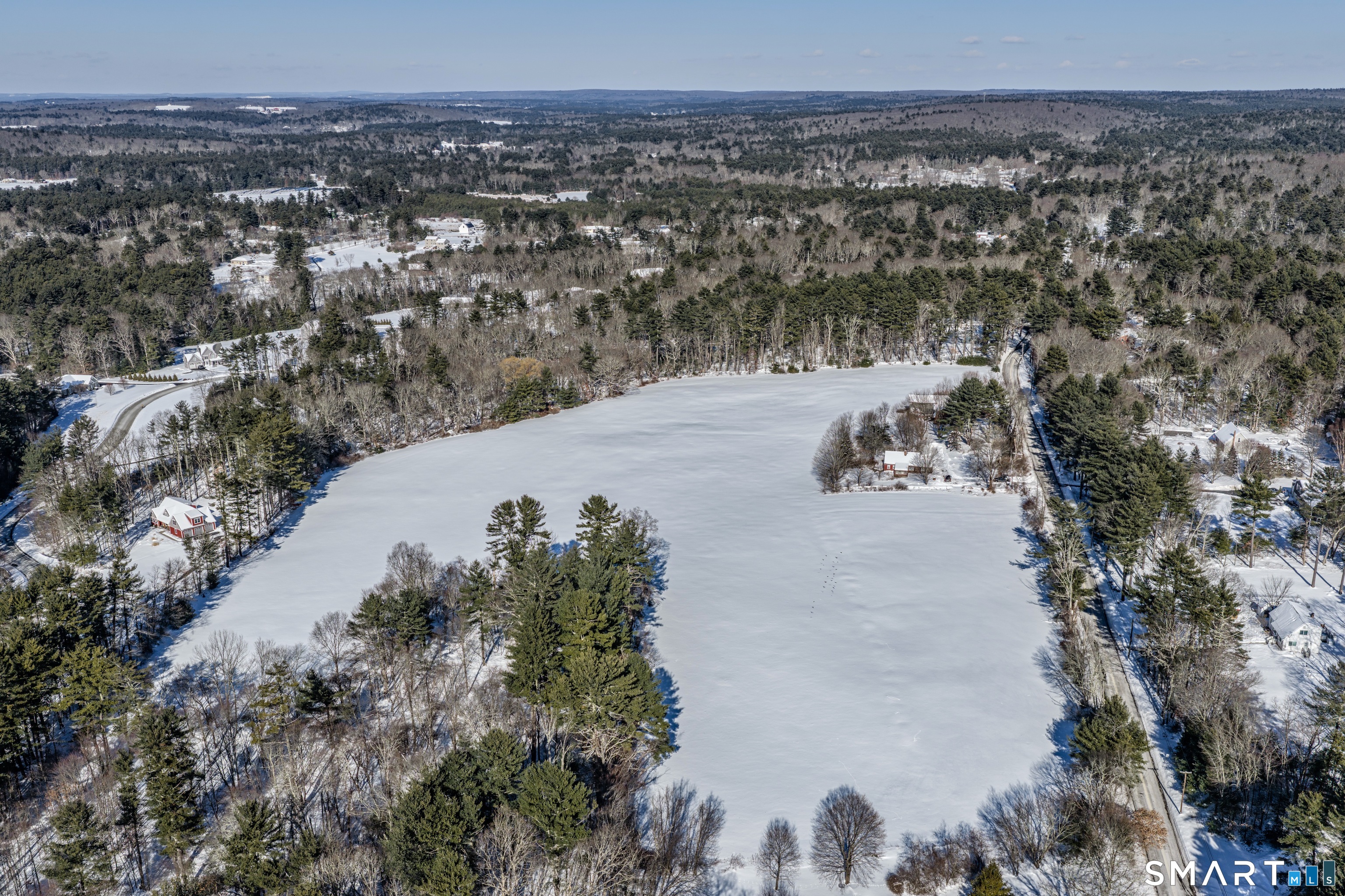 78 East Putnam Road Putnam, CT 06260 - Photo 16 of 26 a view of a lake in middle of a field