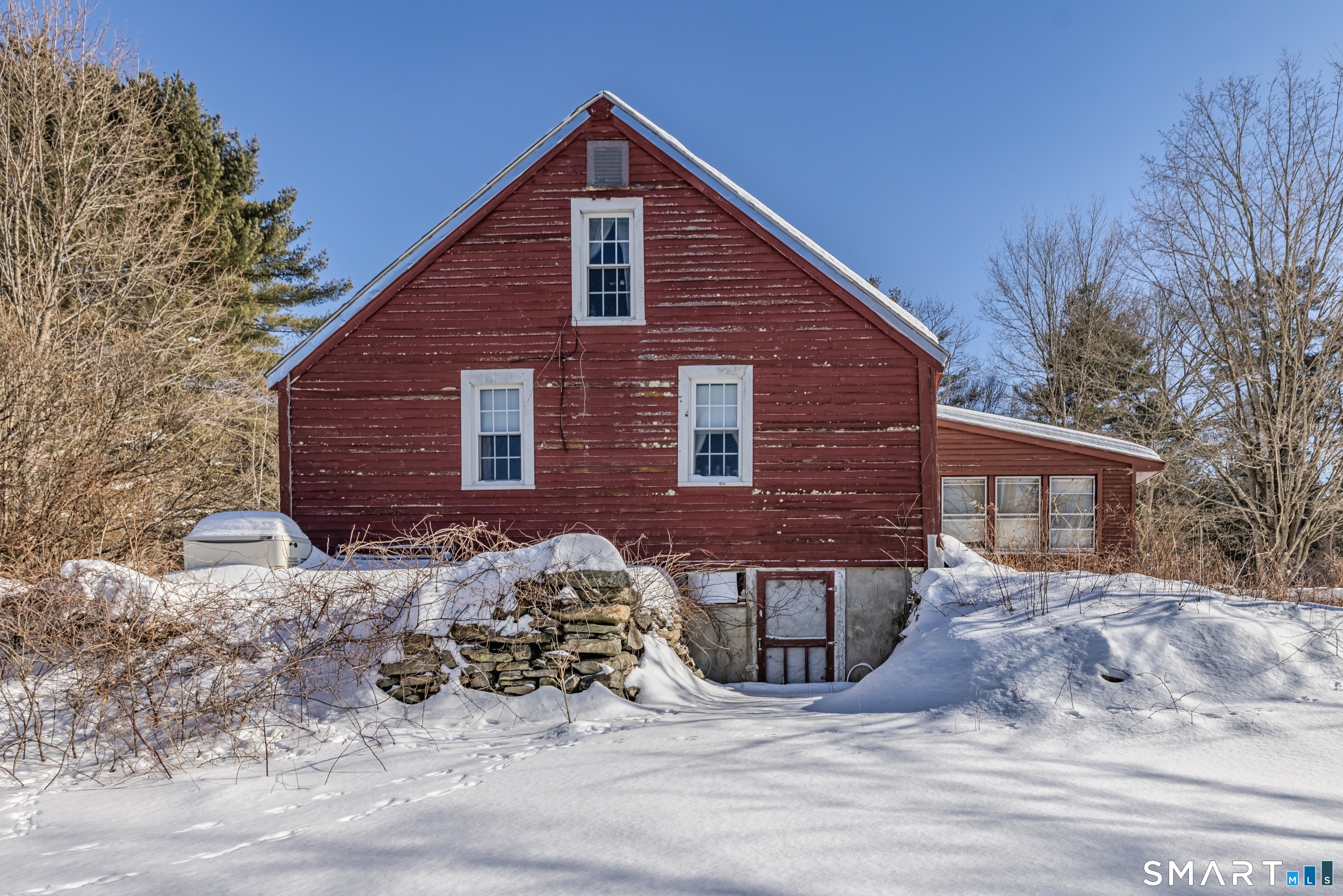 78 East Putnam Road Putnam, CT 06260 - Photo 10 of 26 a view of a house with wooden fence