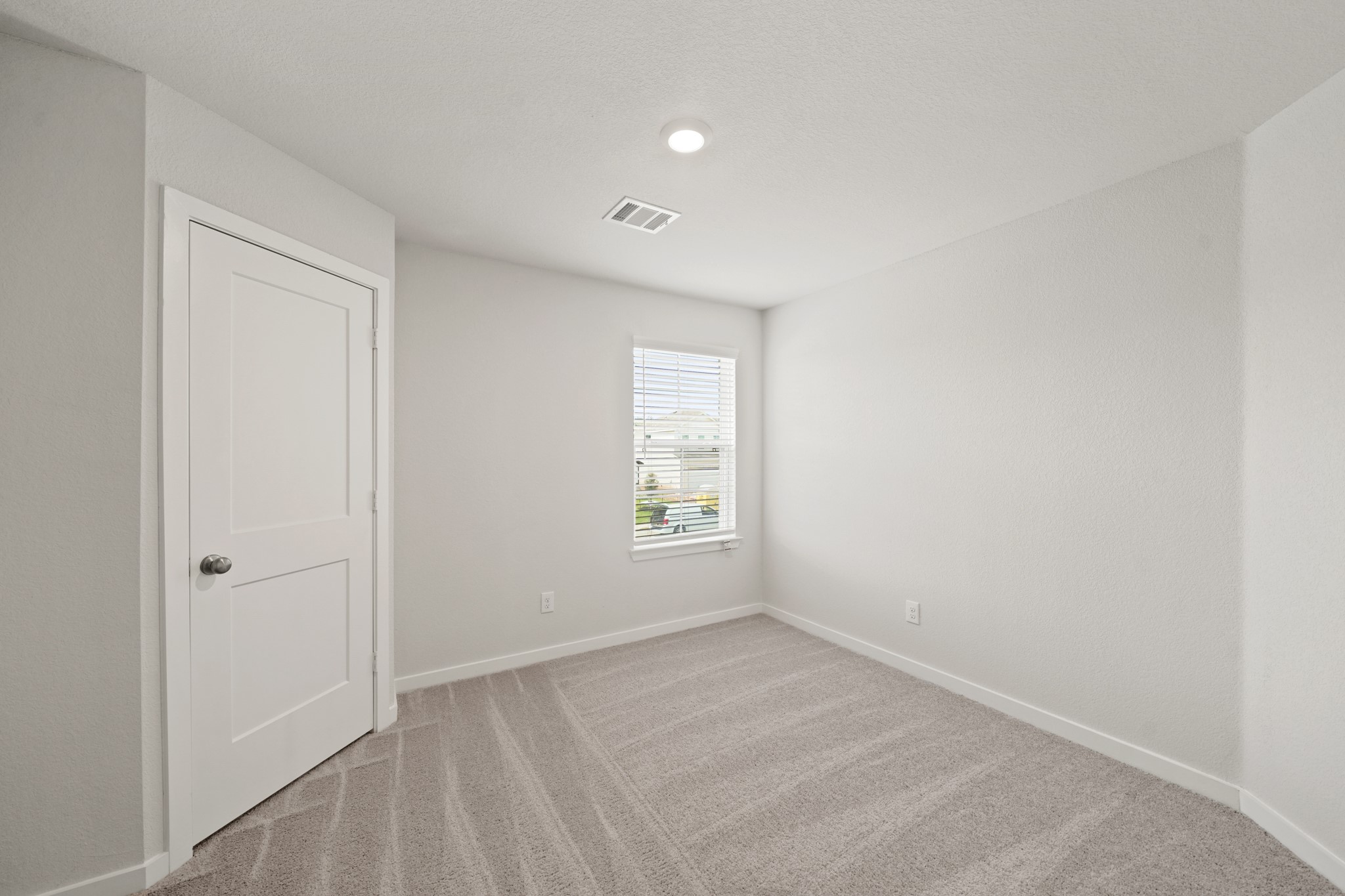 2402 Forshire Road Conroe, TX 77306 - Photo 15 of 24 an empty room with a window