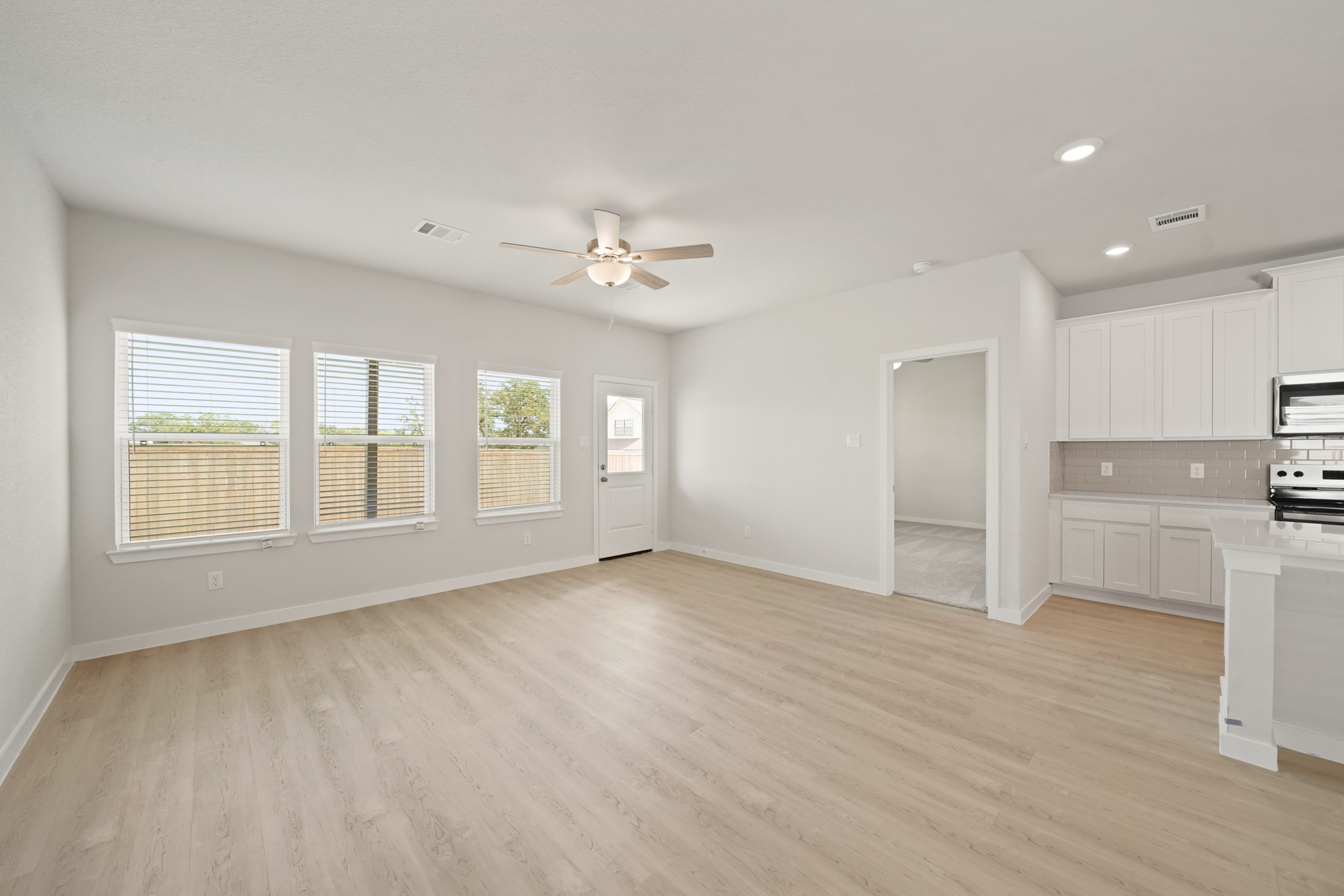 2402 Forshire Road Conroe, TX 77306 - Photo 19 of 24 a view of an empty room with a window