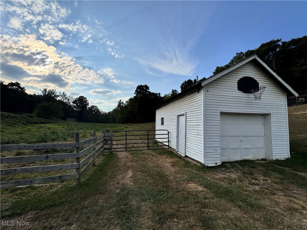 58410 Wharton Road Barnesville, OH 43713 - Photo 31 of 36 Garage featuring a rural view