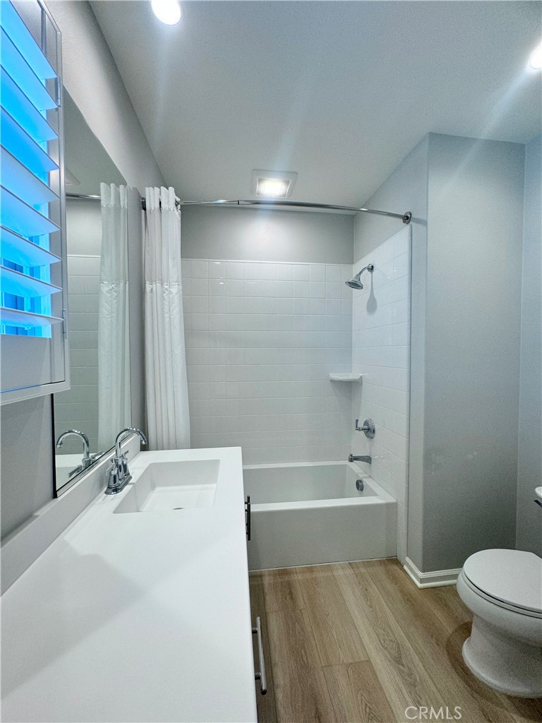 179 Hargrove Irvine, CA 92620 - Photo 19 of 27 a bathroom with a sink a toilet and shower