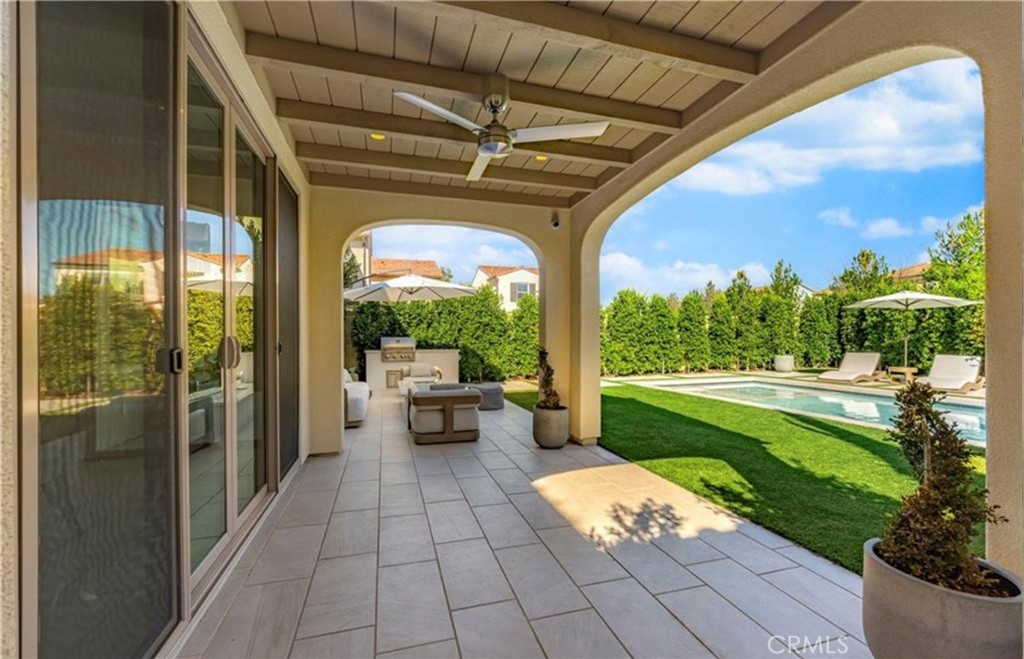 179 Hargrove Irvine, CA 92620 - Photo 21 of 27 a view of a porch with chairs and backyard