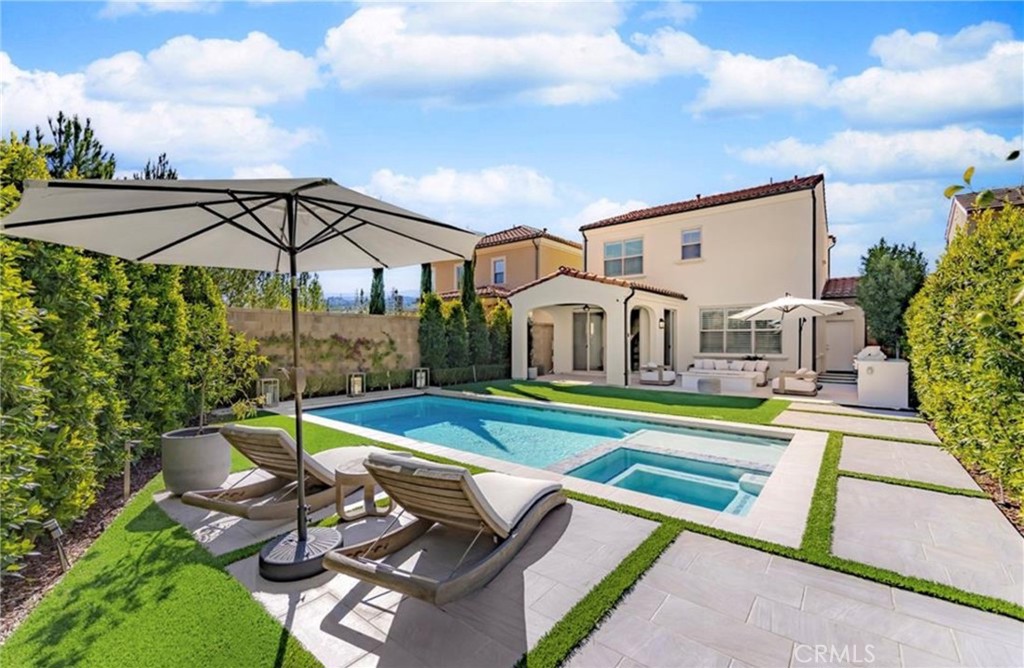 179 Hargrove Irvine, CA 92620 - Photo 23 of 27 a view of a patio with swimming pool table and chairs