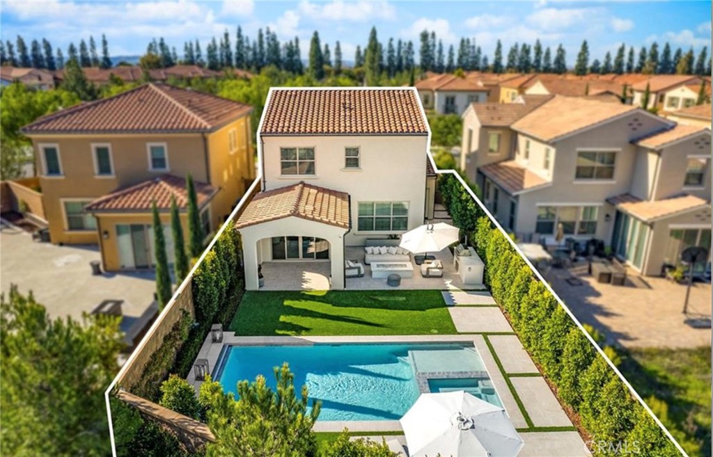 179 Hargrove Irvine, CA 92620 - Photo 27 of 27 an aerial view of a house with swimming pool garden and patio