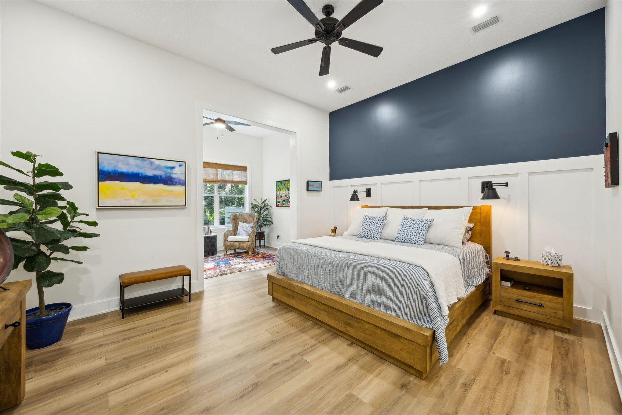 45 Beachwood Road Amelia Island, FL 32034 - Photo 10 of 41 a spacious bedroom with a bed and a potted plant