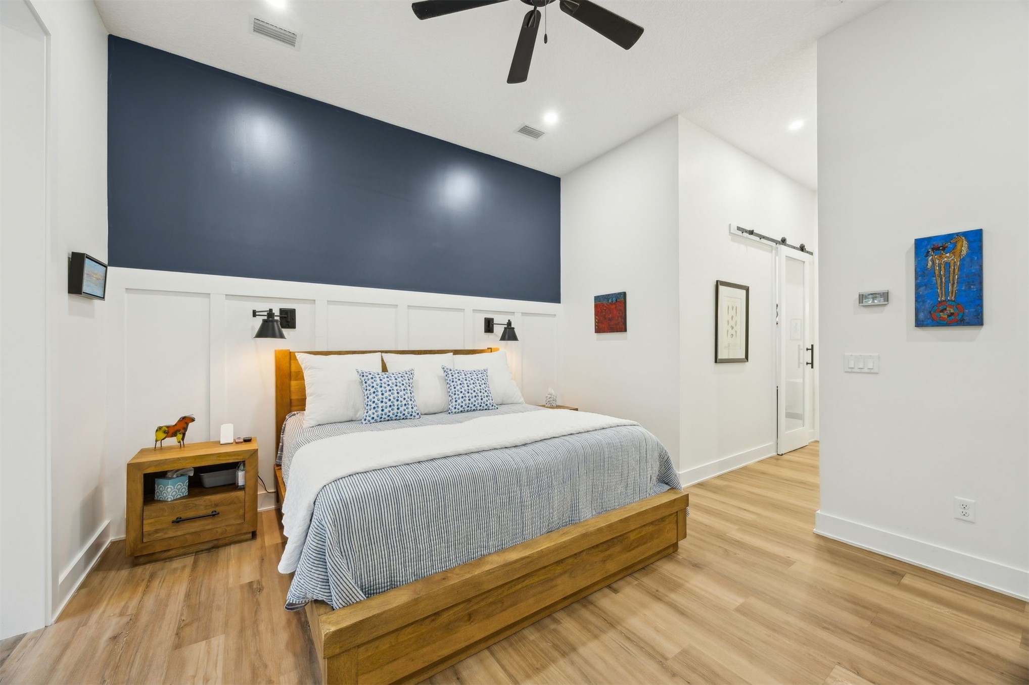 45 Beachwood Road Amelia Island, FL 32034 - Photo 11 of 41 a bedroom with a bed and a flat screen tv