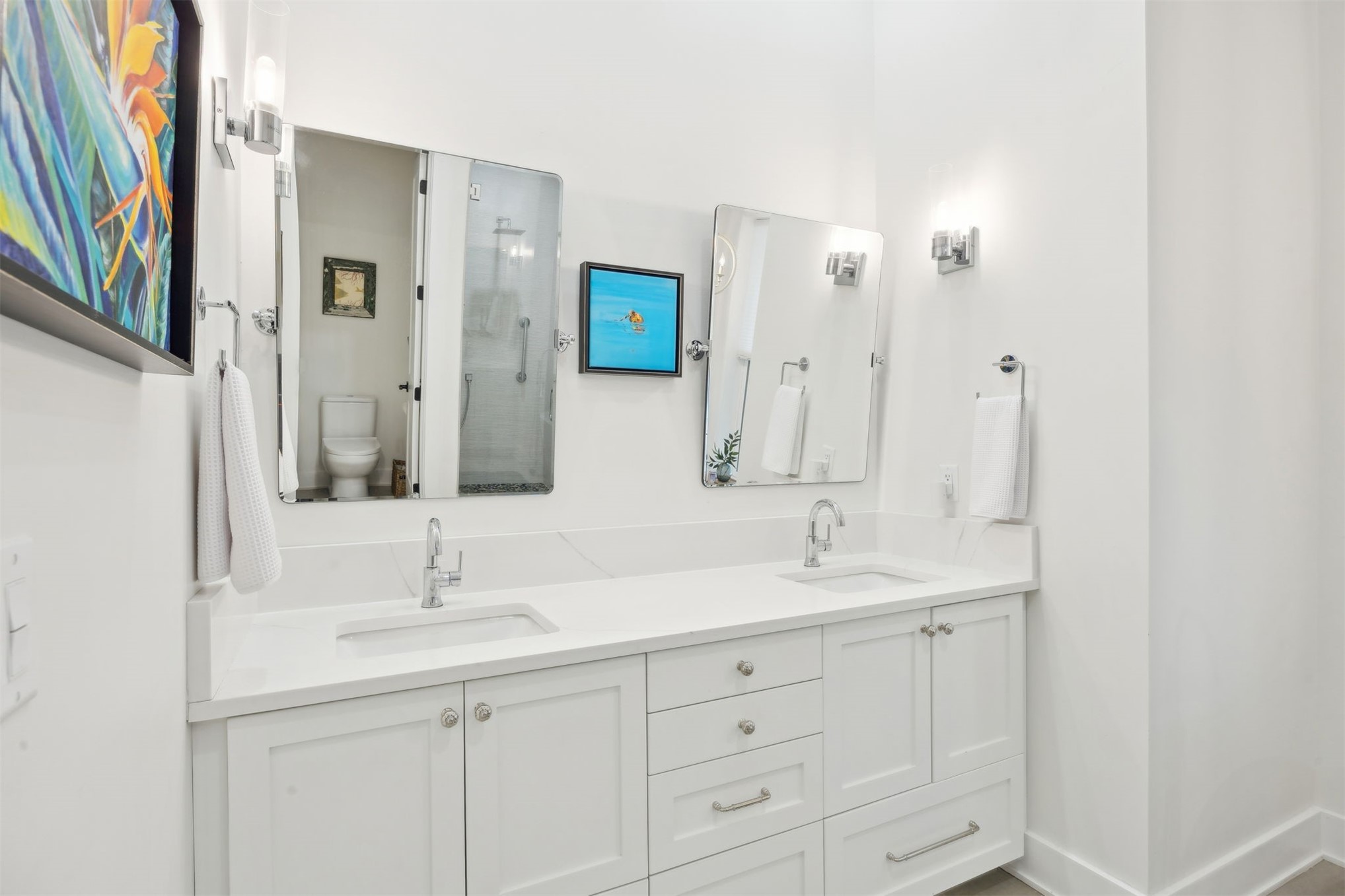 45 Beachwood Road Amelia Island, FL 32034 - Photo 14 of 41 a bathroom with double sink and a mirror
