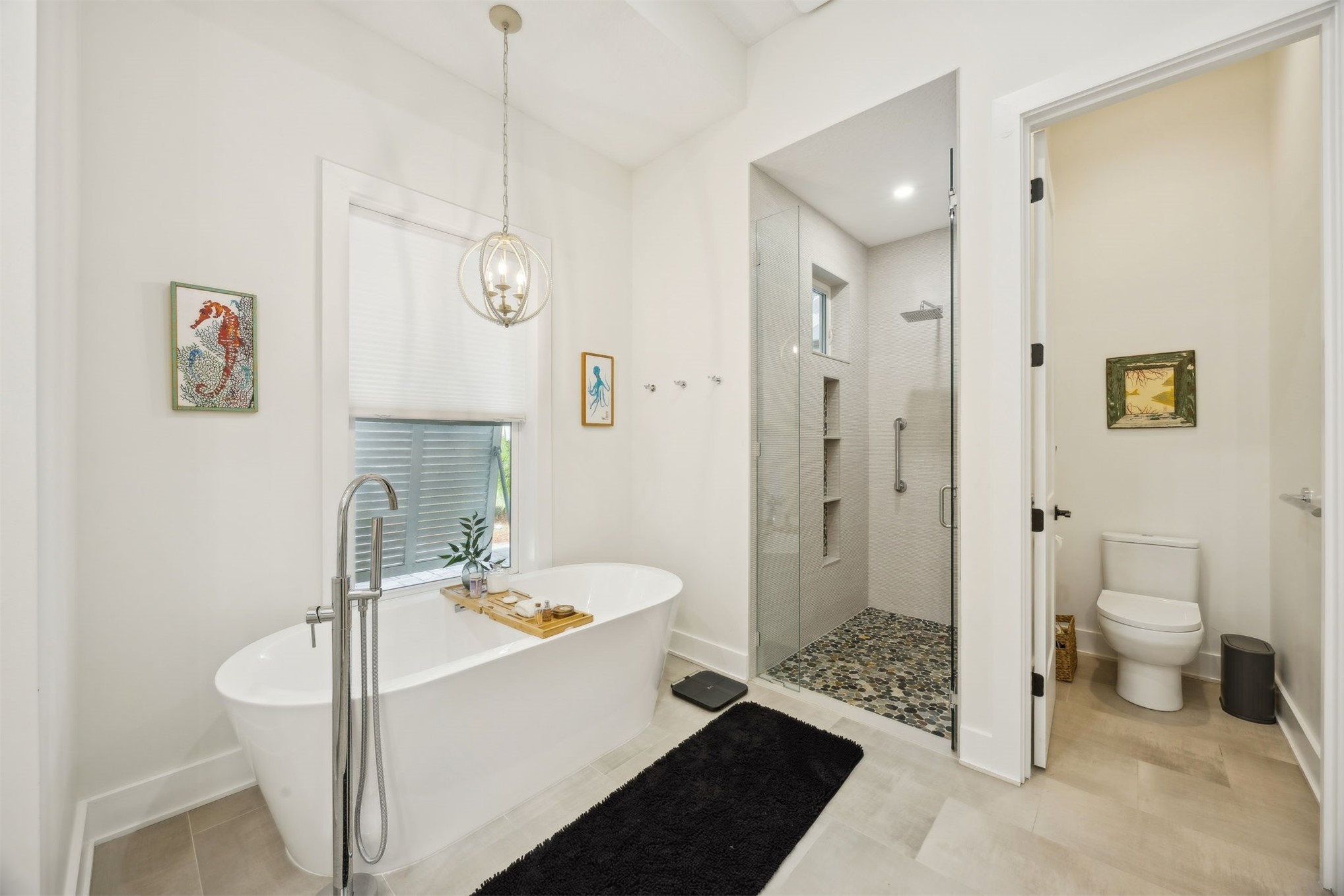 45 Beachwood Road Amelia Island, FL 32034 - Photo 16 of 41 a spacious bathroom with a sink a toilet and shower
