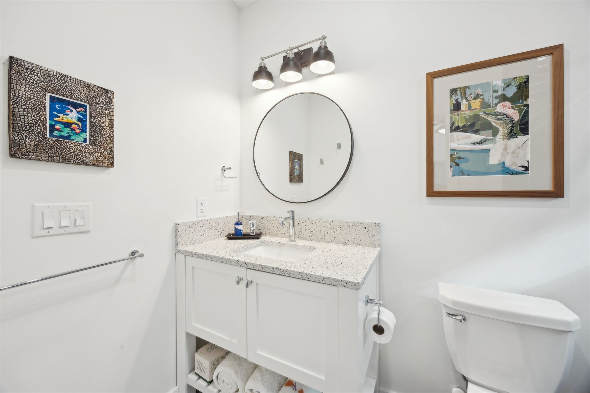 45 Beachwood Road Amelia Island, FL 32034 - Photo 19 of 41 a bathroom with a toilet a sink and a mirror