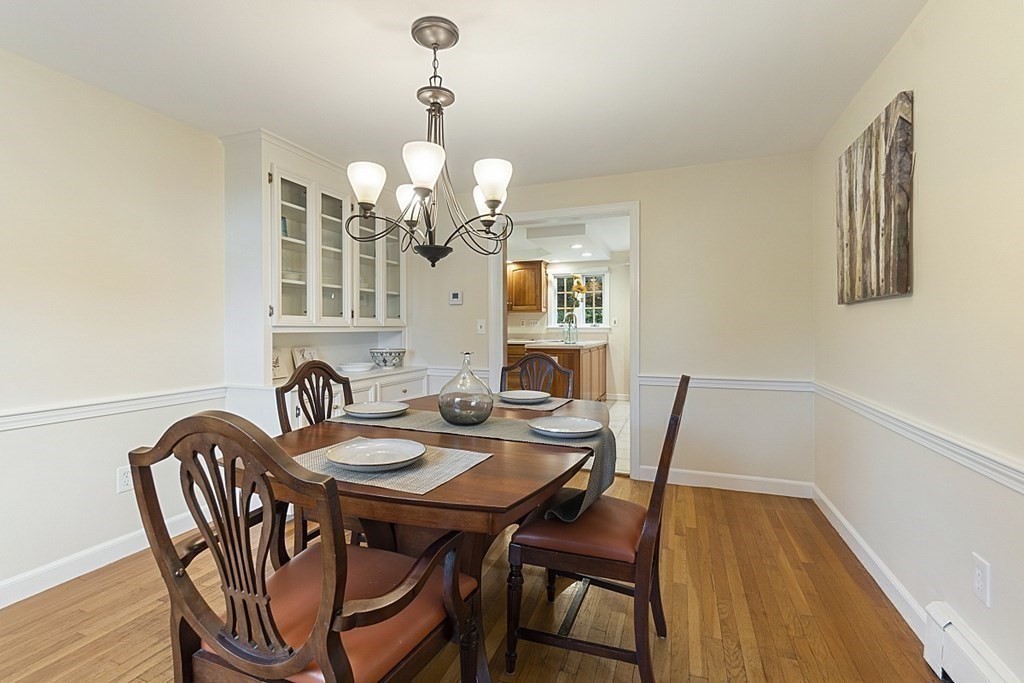 5 Alpine Circle Wakefield, MA 01880 - Photo 16 of 42 a view of a dining room with a table and chairs