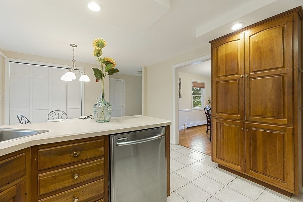 5 Alpine Circle Wakefield, MA 01880 - Photo 23 of 42 a bathroom with a granite countertop sink and a mirror
