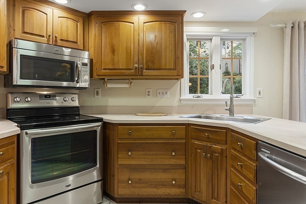 5 Alpine Circle Wakefield, MA 01880 - Photo 24 of 42 a kitchen with a sink stove and microwave