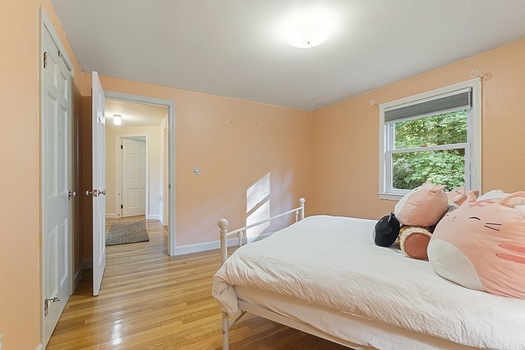5 Alpine Circle Wakefield, MA 01880 - Photo 30 of 42 a bedroom with a bed and a large window