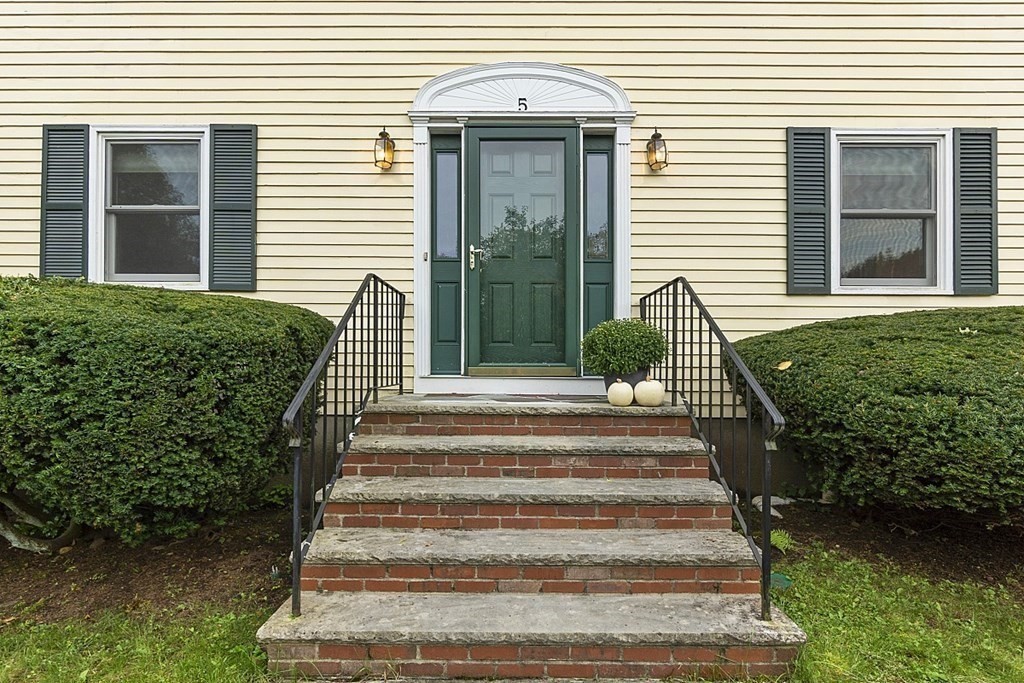 5 Alpine Circle Wakefield, MA 01880 - Photo 3 of 42 a front view of a house with a yard