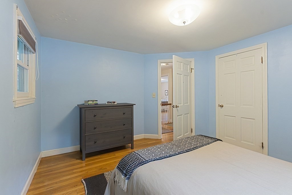 5 Alpine Circle Wakefield, MA 01880 - Photo 32 of 42 a bedroom with a bed and a dresser