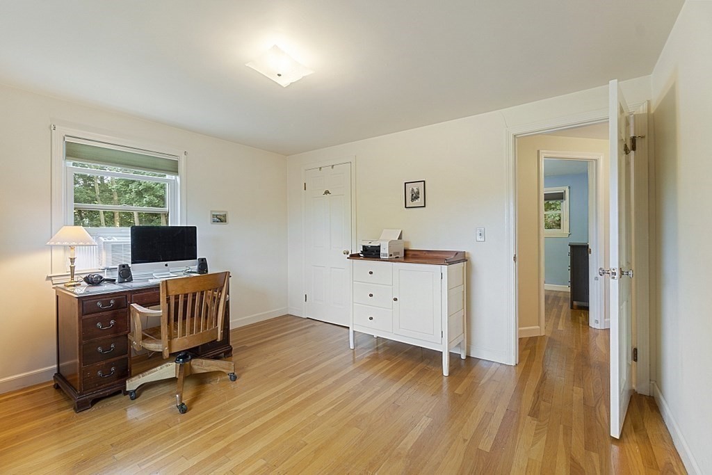 5 Alpine Circle Wakefield, MA 01880 - Photo 34 of 42 a room with chair and wooden floor