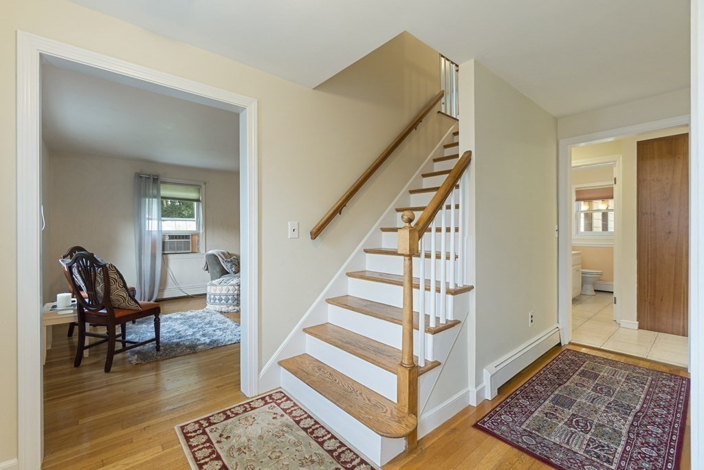 5 Alpine Circle Wakefield, MA 01880 - Photo 7 of 42 a view of a livingroom with furniture and hardwood floor