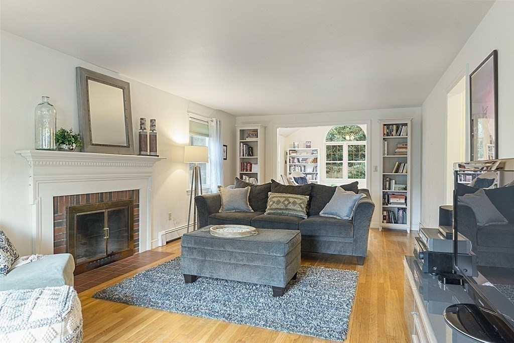 5 Alpine Circle Wakefield, MA 01880 - Photo 9 of 42 a living room with furniture and a fireplace