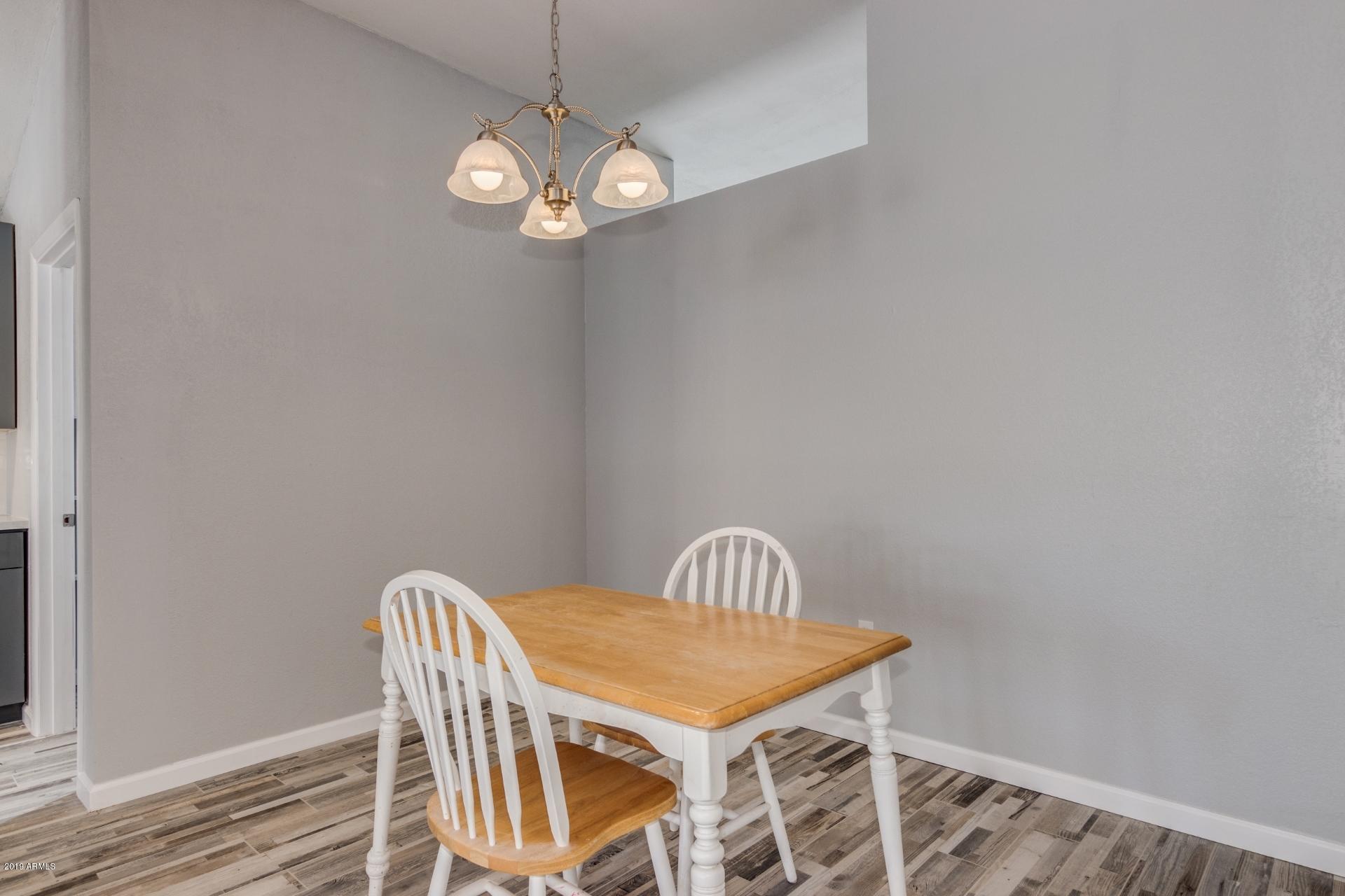 4812 East Gary Street Mesa, AZ 85205 - Photo 12 of 37 a view of a dining area in a room