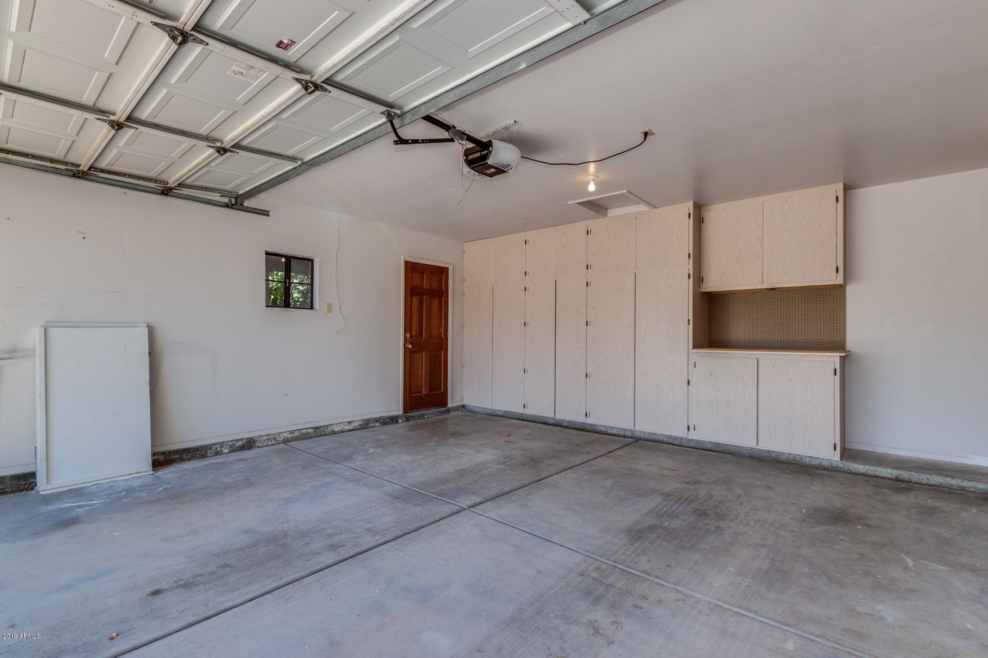 4812 East Gary Street Mesa, AZ 85205 - Photo 20 of 37 a view of a livingroom with an empty space