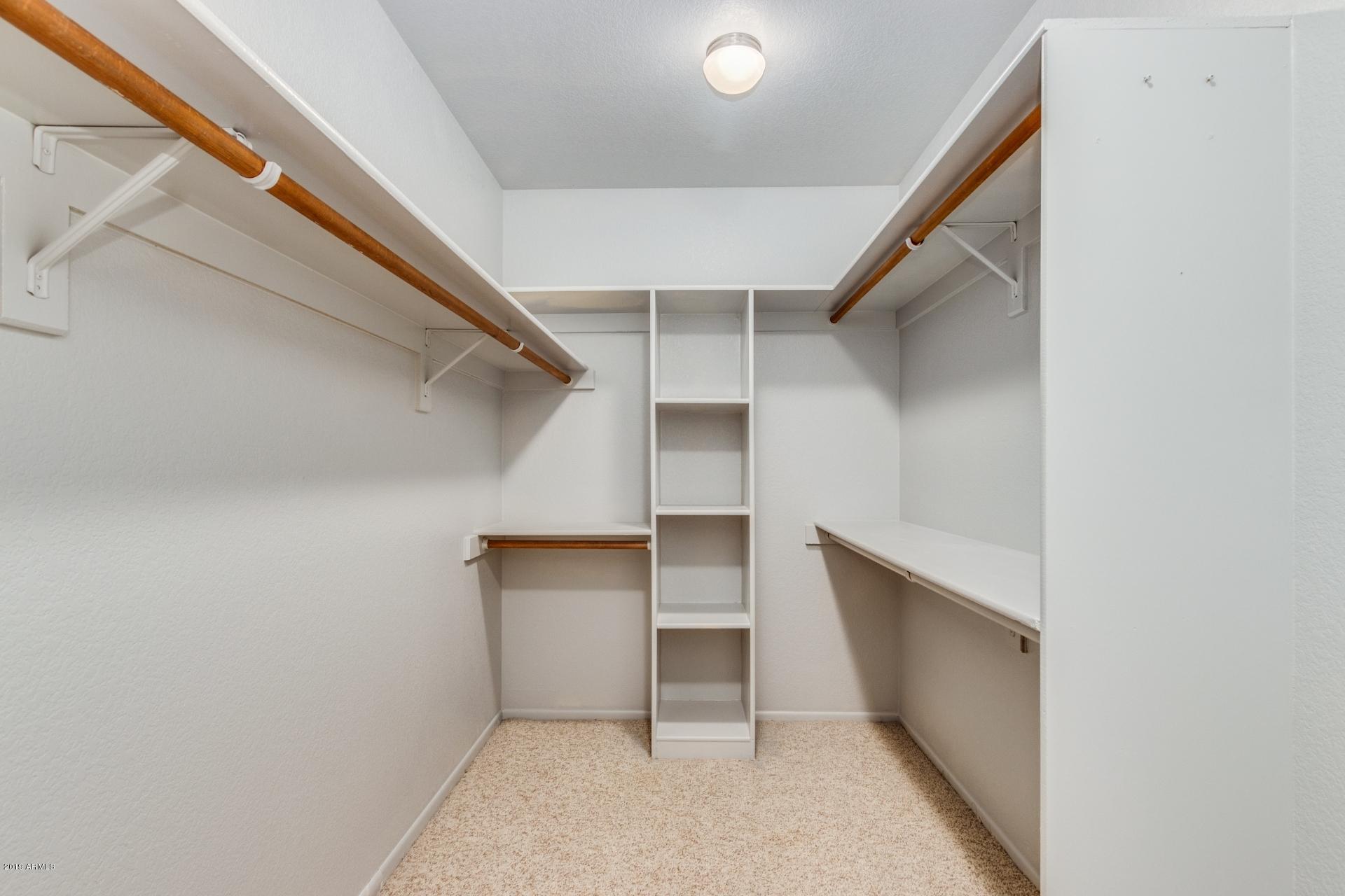 4812 East Gary Street Mesa, AZ 85205 - Photo 32 of 37 a view of an empty walk in closet