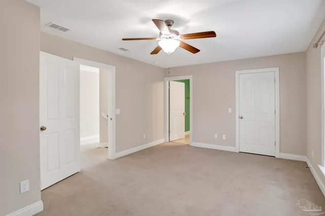 a view of an empty room and window
