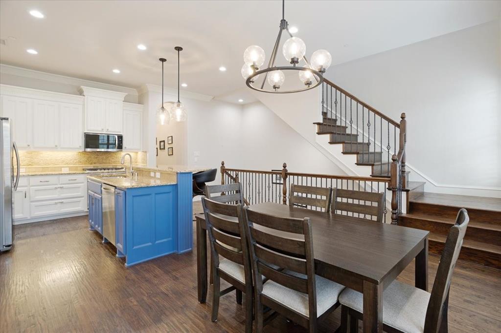 7940 Bishop Road Plano, TX 75024 - Photo 19 of 36 a view of kitchen with cabinets and wooden floor