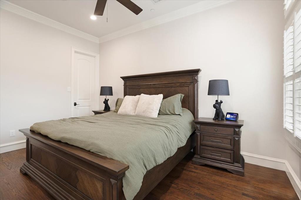 7940 Bishop Road Plano, TX 75024 - Photo 27 of 36 a bedroom with bed and window