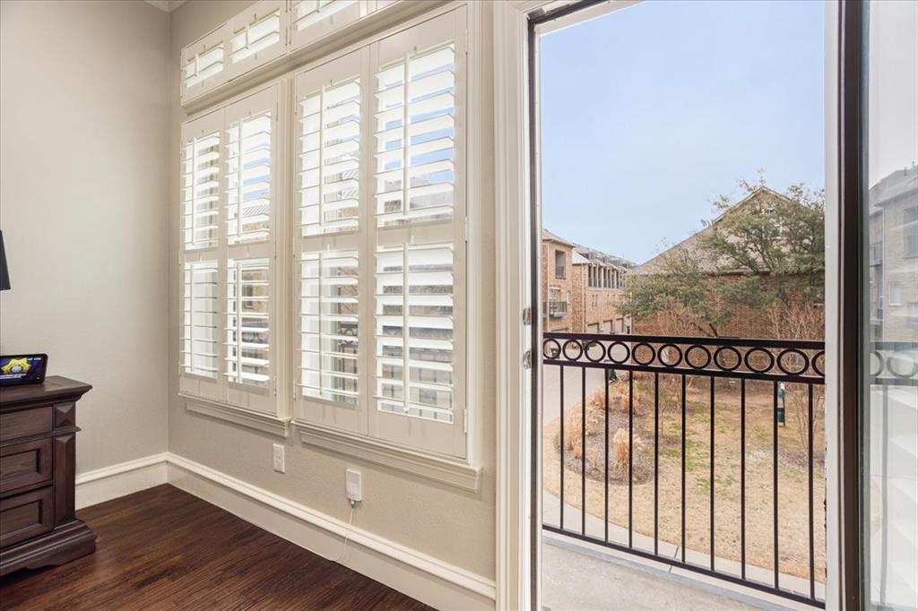 7940 Bishop Road Plano, TX 75024 - Photo 29 of 36 a view of a room with wooden floor and a window