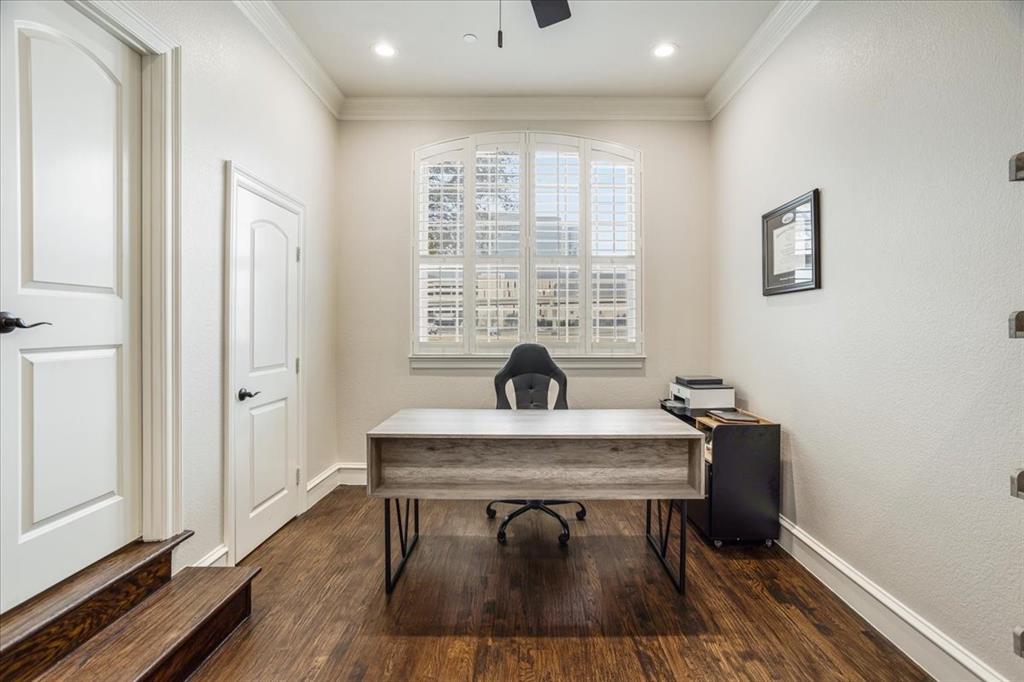 7940 Bishop Road Plano, TX 75024 - Photo 4 of 36 a view of a workspace with furniture and a window