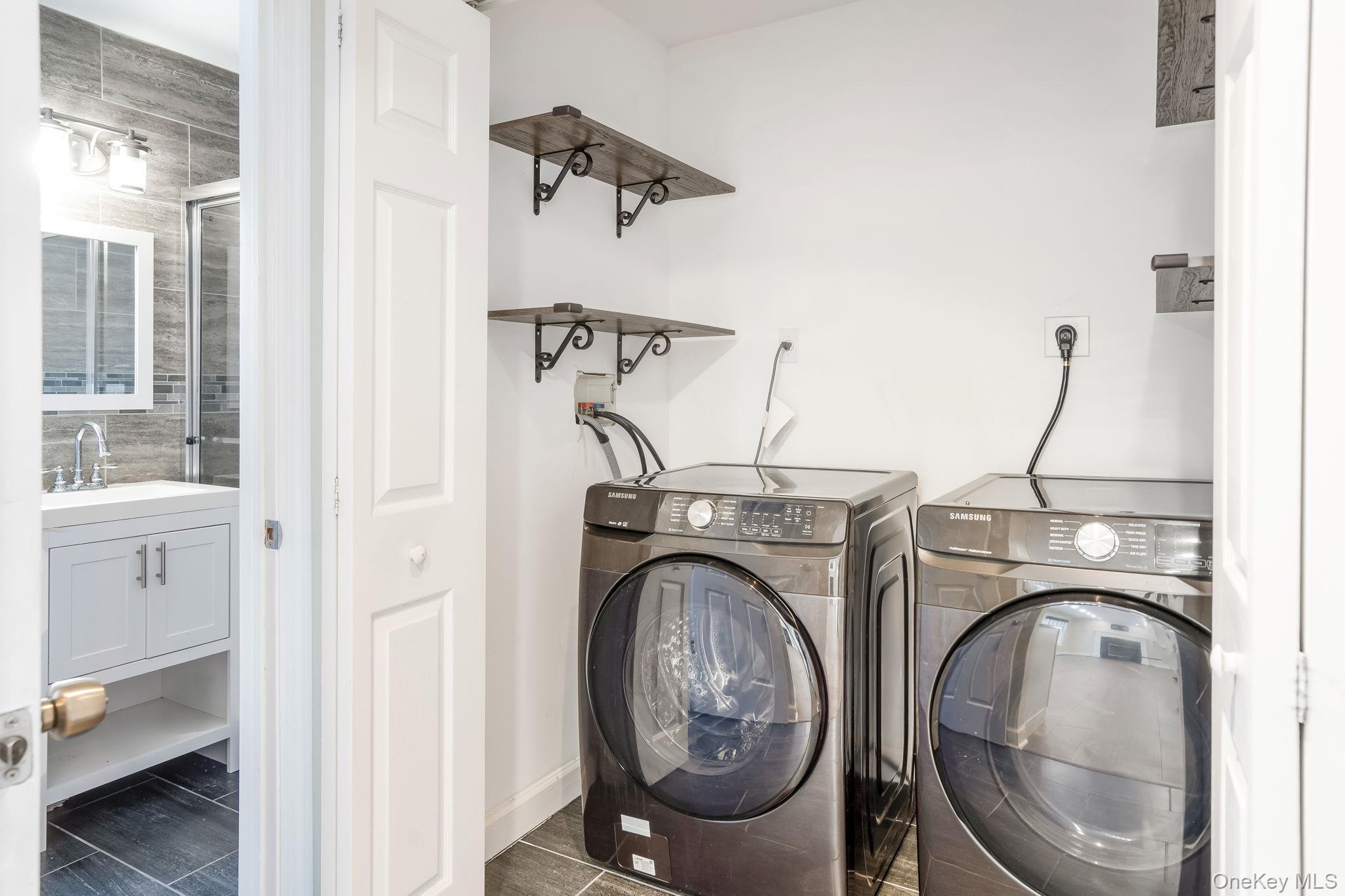 400 Eastport Manor Road Manorville, NY 11949 - Photo 13 of 29 a view of storage and utility room with washer and dryer