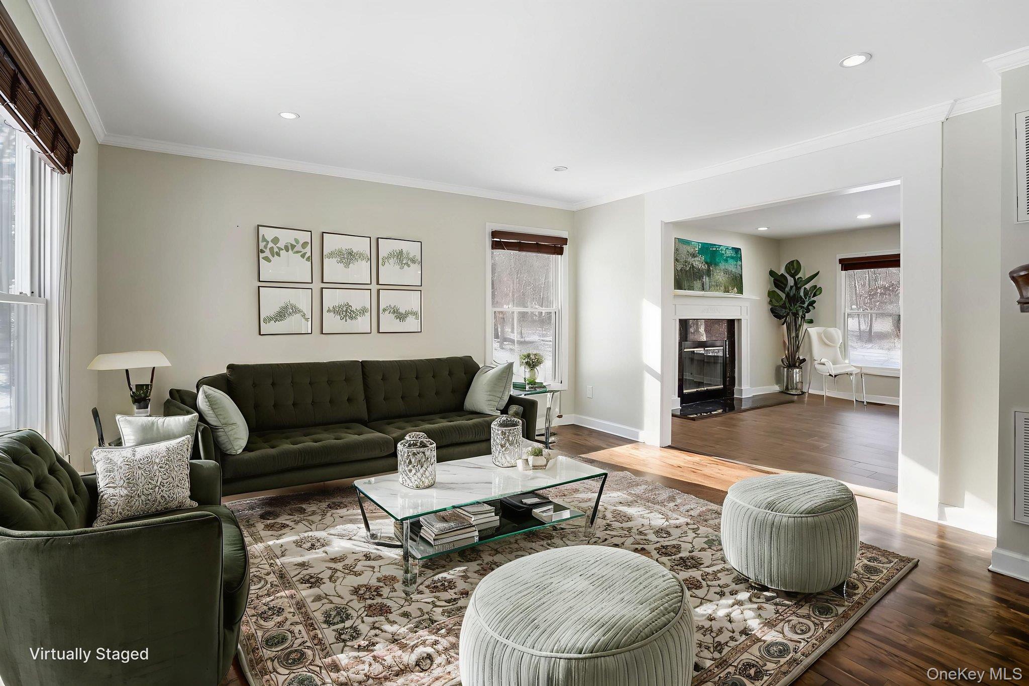400 Eastport Manor Road Manorville, NY 11949 - Photo 5 of 29 a living room with furniture and wooden floor
