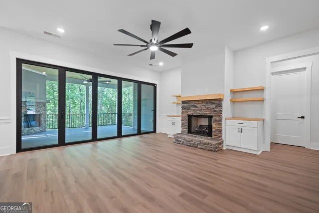 a kitchen with white cabinets and a sink