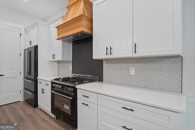 a bathroom with a tub and shower