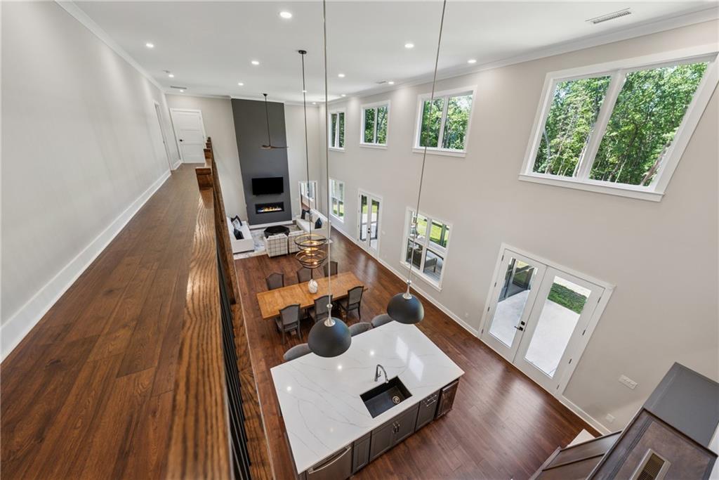 3394 Robinson Road Gainesville, GA 30506 - Photo 17 of 51 a living room with furniture and a wooden floor