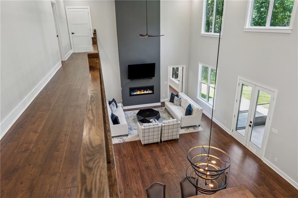 3394 Robinson Road Gainesville, GA 30506 - Photo 18 of 51 a living room with furniture and a flat screen tv