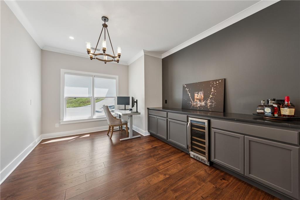 3394 Robinson Road Gainesville, GA 30506 - Photo 20 of 51 a kitchen with sink cabinets and wooden floor