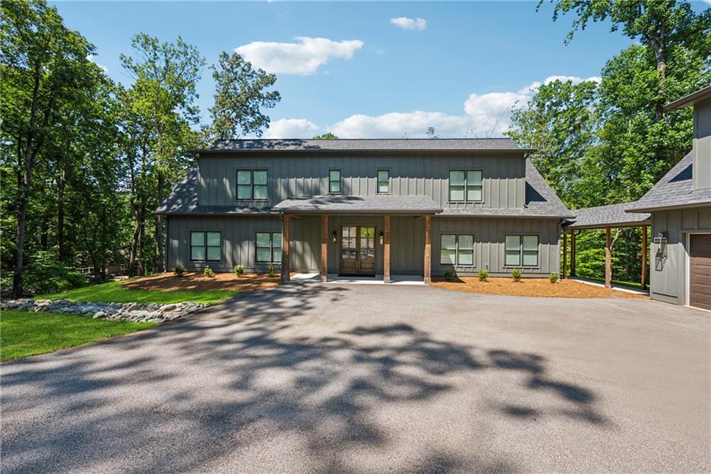 3394 Robinson Road Gainesville, GA 30506 - Photo 2 of 51 a view of a house with a yard and sitting area