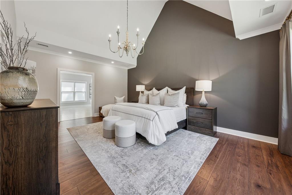 3394 Robinson Road Gainesville, GA 30506 - Photo 22 of 51 a bedroom with bed and wooden floor